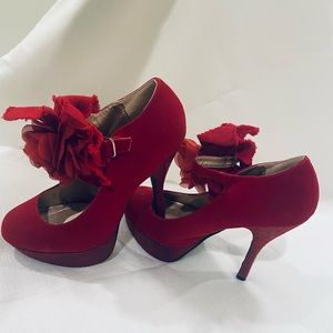 Red high heel pumps